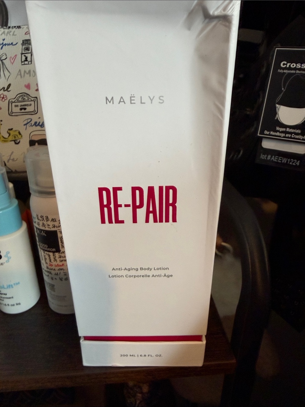 MAËLYS RE-PAIR Anti-Aging Body Lotion - White with Red Text
